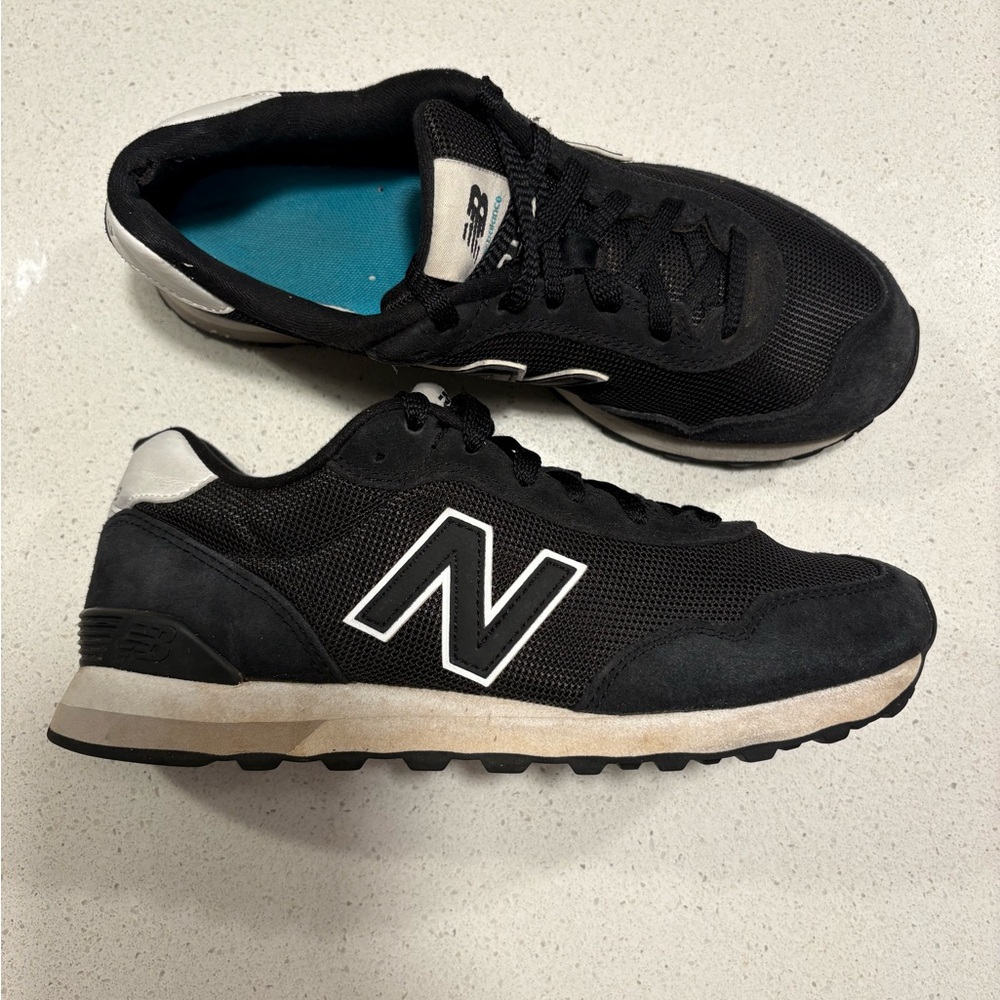 New Balance Women's Black Athletic Sneakers with White Accents